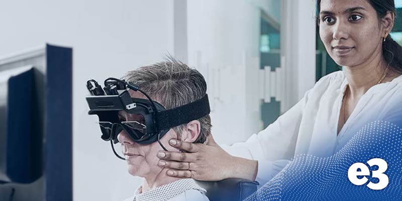 Patients head being tilted with VNG goggles on