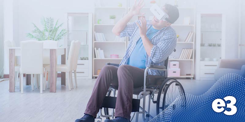 Man in wheel chair using virtual reality for physical therapy