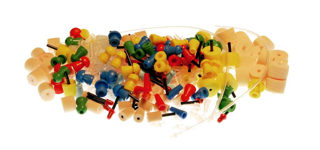 A pile of eartips and insert earphone foam tips